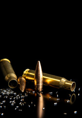 Close-up of disassembled rifle cartridges. Bullet isolated on black background with reflexion. Granulated gunpowder.