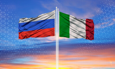 Russia and Italy two flags on flagpoles and blue cloudy sky..