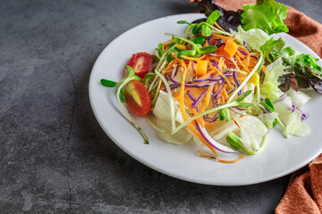 Vegetable salad healthy vegetarian food on a plate