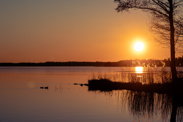Fototapeta premium sunset over the lake