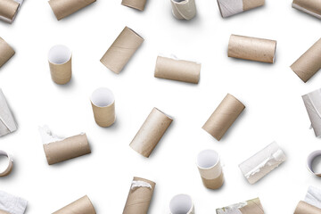 Seamless background with cardboard rolls from toilet paper. A backdrop on the topic of ecology and waste recycling during the global crisis and the lack of basic materials.