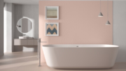 Fototapeta na wymiar Blur background, cozy minimalist bathroom, freestanding bathtub, tiles and concrete walls, washbasin, mirror, armchair, colored paintings and decors, interior design concept