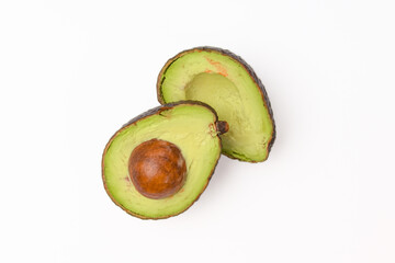 avocado fruit cut in half isolated on white background