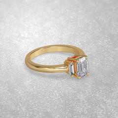 3 stone engagement ring laying down position in yellow gold 3D render