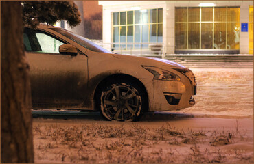 dirty car in the winter street