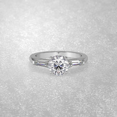3 stone engagement ring laying down position in white gold 3D render
