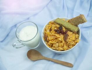 Cereal and yoghurt put on background