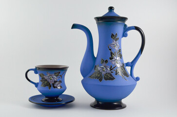 vintage teapot and cup on saucer.ceramics.