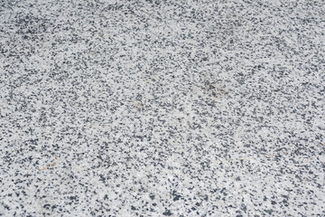 Close-up, texture, background of gray granite wall.