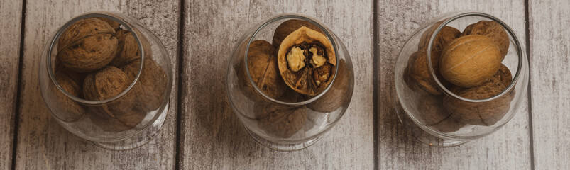 walnut in a plate, scattered on the table