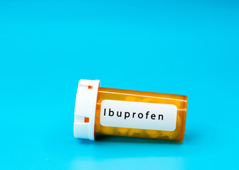 Ibuprofen   Medical vial with pills. Medical pills in orange Plastic Prescription. most popular...