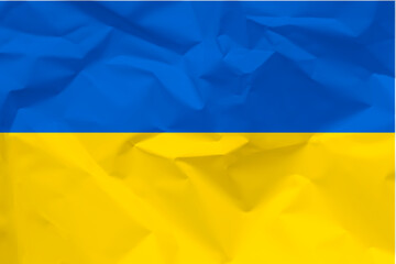Flag of Ukraine on a crumpled paper texture. Relations between Ukraine and Russia