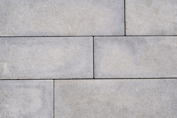 Close up, gray brown paving slab texture background.