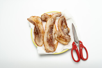 Rashers of bacon, grilled at the table and dipped in a mixture of sesame oil and salt.