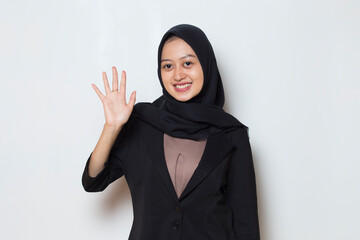 Asian muslim business woman in hijab say hello
