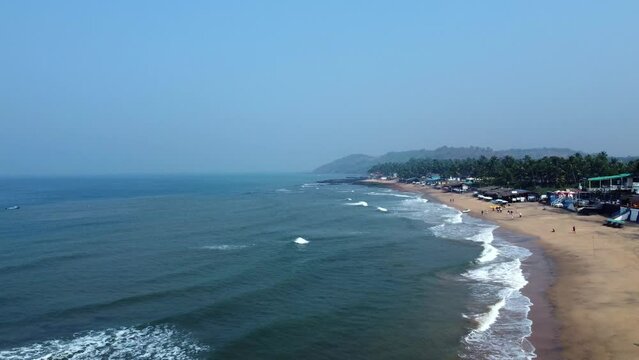 Anjuna Beach, Goa, India.Flight over the sandy beach, 2 hours before the sunset. Arabic see and it's warm and calm waves!