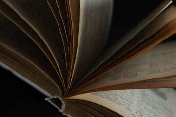 Macro, Sheets of the book on a black background.