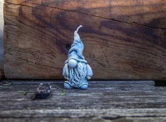candle in the form of a gnome made of natural wax