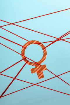 Venus symbol hanging on ropes