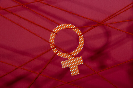 Venus symbol hanging on ropes