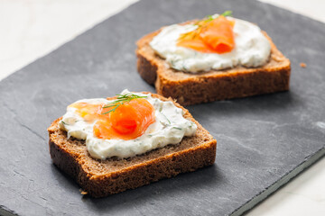 whole grain bread with dill spread and smoked salmon