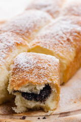 traditional Czech  poppy stuffed buns on wooden board