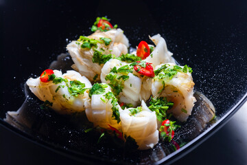 marinated sepia with parsley and chilli pepper filled with rice