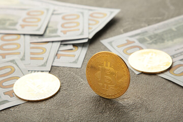 Bitcoin coin and cash on grey background. Bitcoin growthand investment concept.