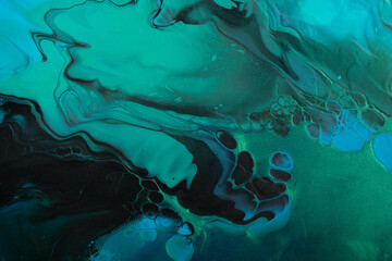Fluid Art. Metallic Green and blue abstract waves with golden particles on black background. Marble...