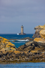 Fototapeta premium Coast with Phare du Four near Argenton in Brittany, France