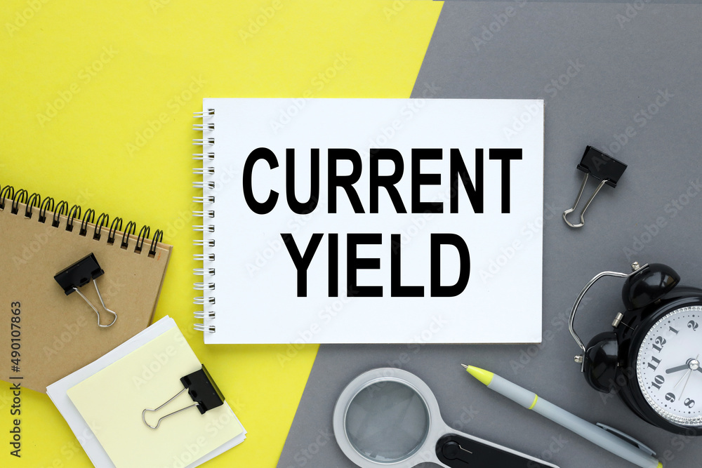 Poster current yield gray and yellow background with notepad. text on white paper