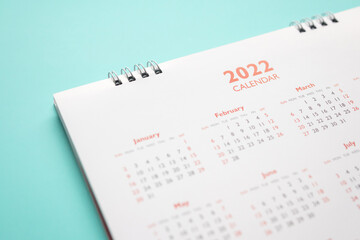 2022 calendar page on blue background business planning appointment meeting concept