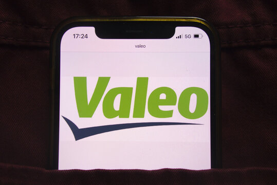 KONSKIE, POLAND - February 27, 2022: Valeo SA logo on mobile phone hidden in jeans pocket