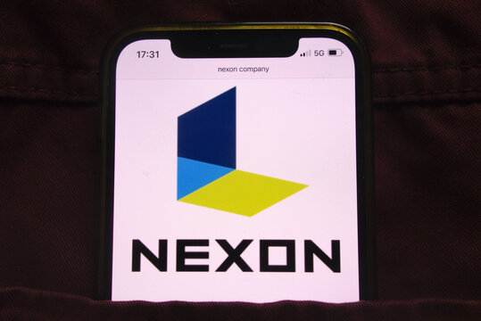 KONSKIE, POLAND - February 27, 2022: Nexon Co Ltd Logo On Mobile Phone Hidden In Jeans Pocket