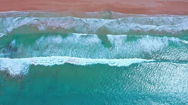 Australia beach aerial view. Ocean waves crush on sea shore. Victoria nature