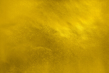 Golden metallic foil paper background texture