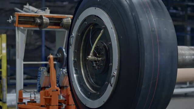 Factory tyre blank production process in modern warehouse rubber tape rotating