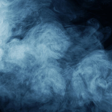 Smoke over black background. Fog or steam texture. © Acronym