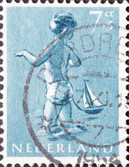 Netherlands - circa 1954: a postage stamp from the Netherlands , showing in Children postage Stamp...