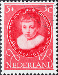 Netherlands - circa 1955: a postage stamp from the Netherlands , showing a Children postage Stamp...