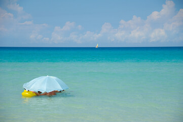 Parasol at exotic beach