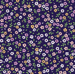 Vector seamless pattern. Pretty pattern in small flowers. Small colorful flowers. Blue background. Ditsy floral background. The elegant the template for fashion prints. Stock vector.