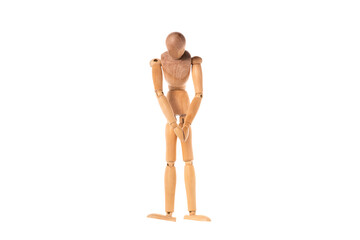 a wooden man stands sad with his head down isolated on a white background