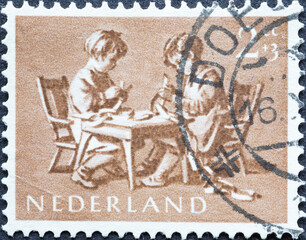 Netherlands - circa 1954: a postage stamp from the Netherlands , showing in Children postage Stamp...