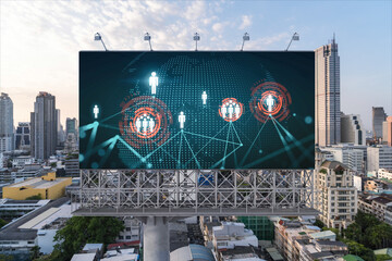 World planet Earth map hologram of social media icons over sunset panoramic cityscape of Bangkok, Southeast Asia. The concept of people connections.
