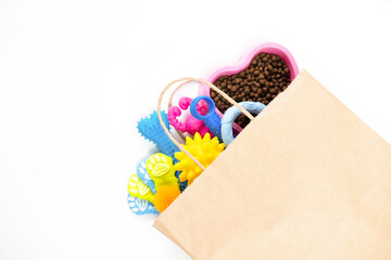 Tasty pet food and accessories on white background copys space delivery