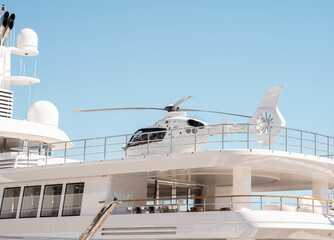 Helicopter landed on super yacht helideck on Monaco show