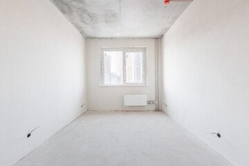 interior of the apartment without decoration in gray colors