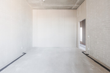 interior of the apartment without decoration in gray colors