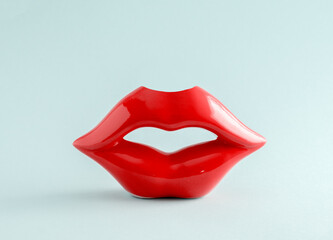 Red lips on a blue background.